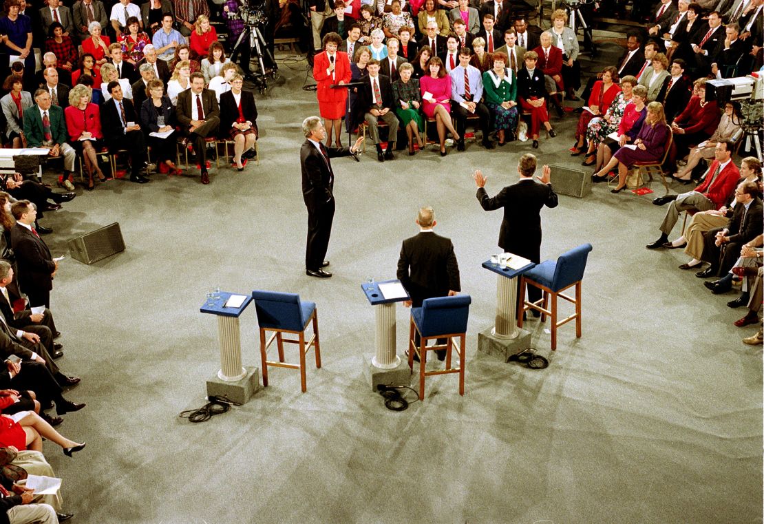 Moderator Carole Simpson presides over the presidential debate between Democratic presidential candidate Bill Clinton, Independent candidate Ross Perot and Republican candidate, President George H.W. Bush, at the University of Richmond, Virginia, in 1992. 
