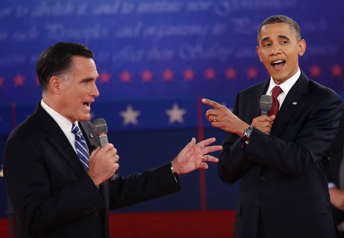 Republican presidential candidate Mitt Romney and President Barack Obama answer questions during a town hall style debate at Hofstra University in Hempstead, New York, in 2012.