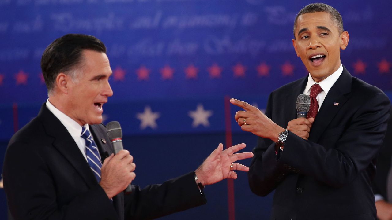 Republican presidential candidate Mitt Romney and US President Barack Obama talk over each other as they answer questions during a debate at Hofstra University October 16, 2012 in Hempstead, New York.