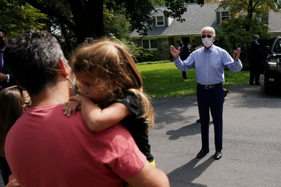 Biden speaks with supporters from a distance after he met with labor leaders in Lancaster, Pennsylvania, on September 7.