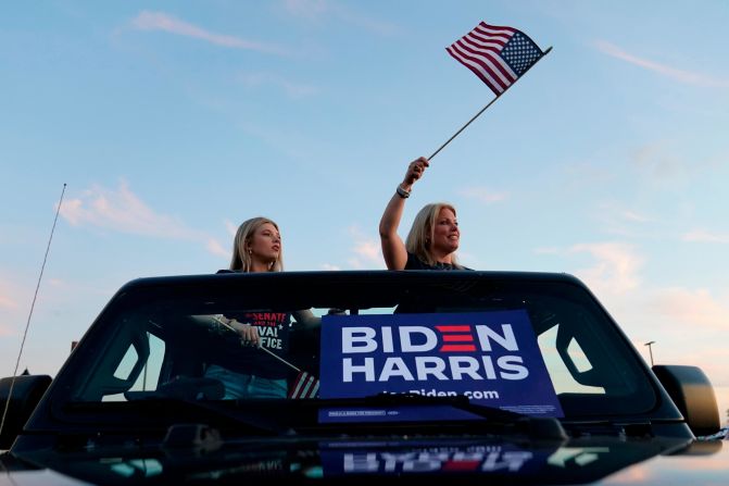 Delaware state Sen. Nicole Poore and her daughter Alexis rally outside the Chase Center during the Democratic National Convention on August 20.