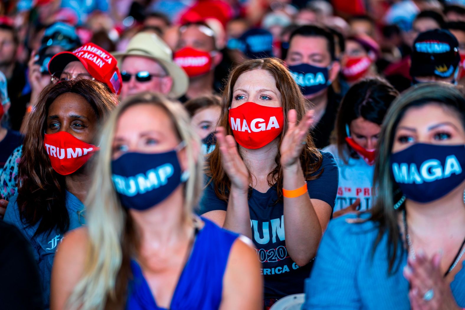 Trump supporters attend a rally in Yuma, Arizona, on August 18. The President delivered a <a href="index.php?page=&url=https%3A%2F%2Fwww.cnn.com%2F2020%2F08%2F18%2Fpolitics%2Fdonald-trump-yuma-arizona-border-patrol-endorsement%2Findex.html" target="_blank">wide-ranging speech</a> to a crowd with little to no physical distancing.