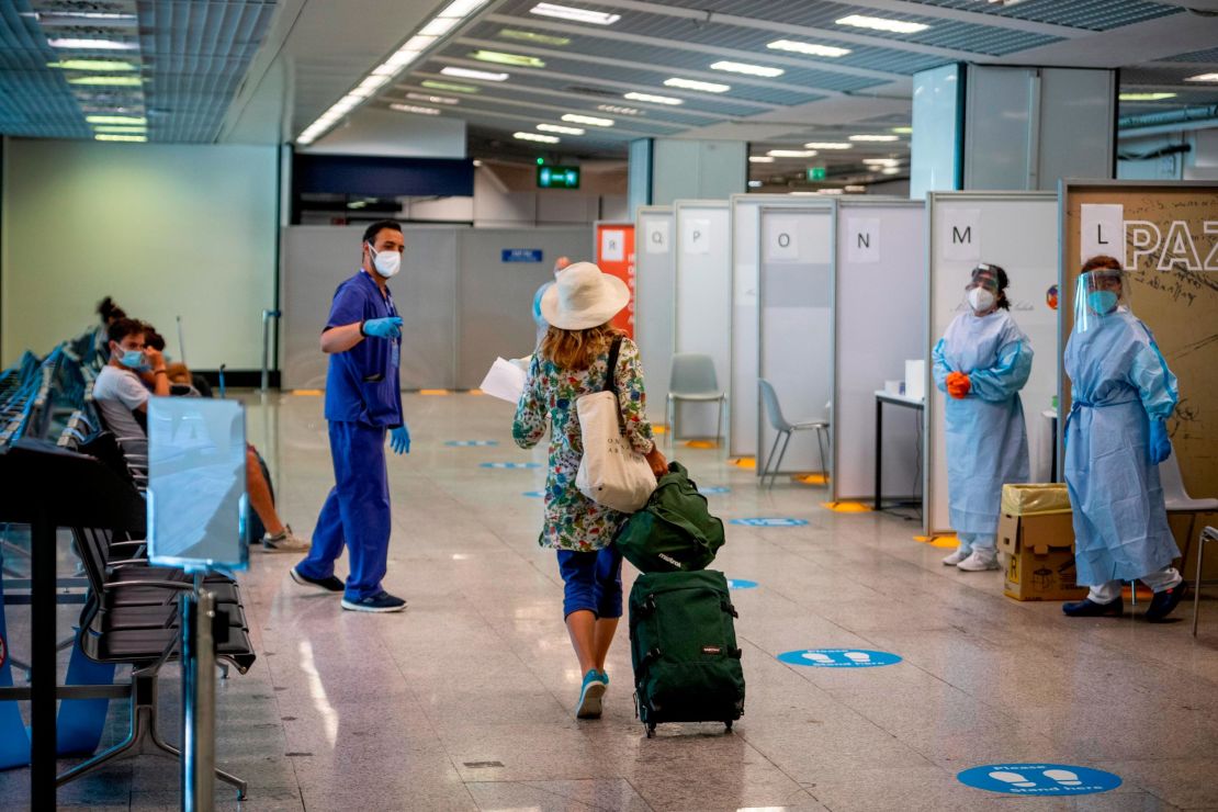 Countries around the world have implemented travel restrictions. Shown here: a testing center in Rome.