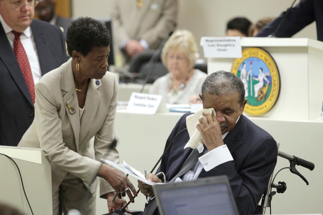 North Carolina state Rep. Larry Womble wipes away tears in 2012 as he tells his fellow legislators to do what's right and approve funding for a program to provide compensation for victims of North Carolina's forced sterilization program.