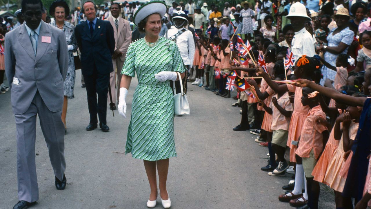 Queen Elizabeth ll is greeted by the public during a walkabout in Barbados in 1977.
