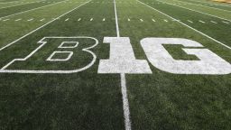 FILE - In this Aug. 31, 2019, file photo, the Big Ten logo is displayed on the field before an NCAA college football game between Iowa and Miami of Ohio in Iowa City, Iowa. The Big Ten released its 10-game conference-only football schedule beginning as early as Labor Day weekend but cautioned there is no certainty games will be played. (AP Photo/Charlie Neibergall, File)