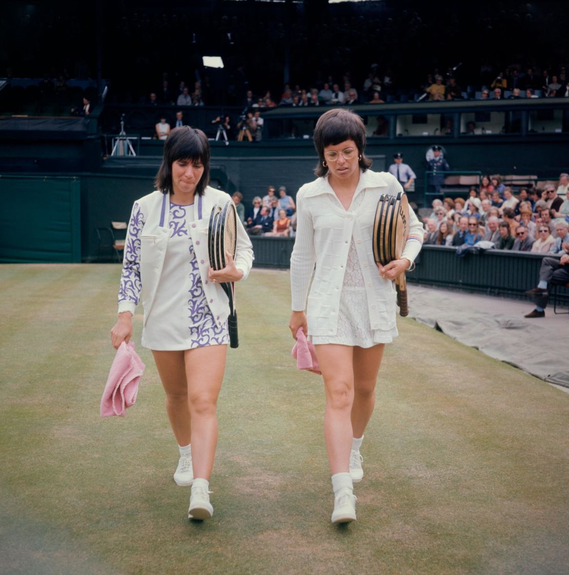 King (right) and Casals take to the court for their Wimbledon semifinal in 1972. 