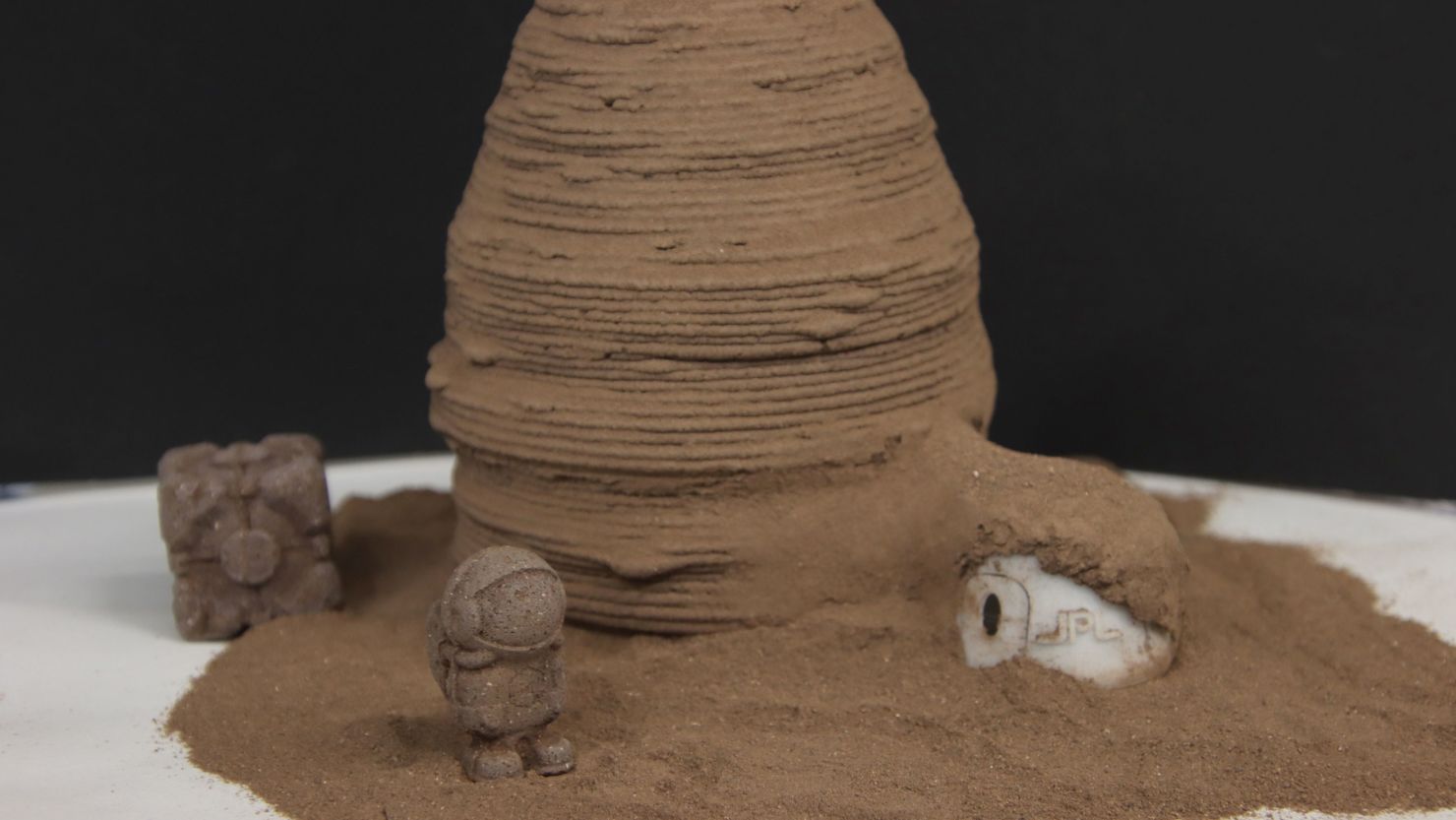 A simple manufacturing technology based on chitin, one of the most ubiquitous organic polymers on Earth, could be used to build tools and shelters on Mars, according to a study published Wednesday. Pictured: A model of what a Martian habitat made from the material could look like.