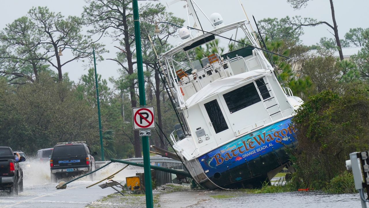 A boat is washed up near a road after Hurricane Sally in Orange Beach, Alabama.