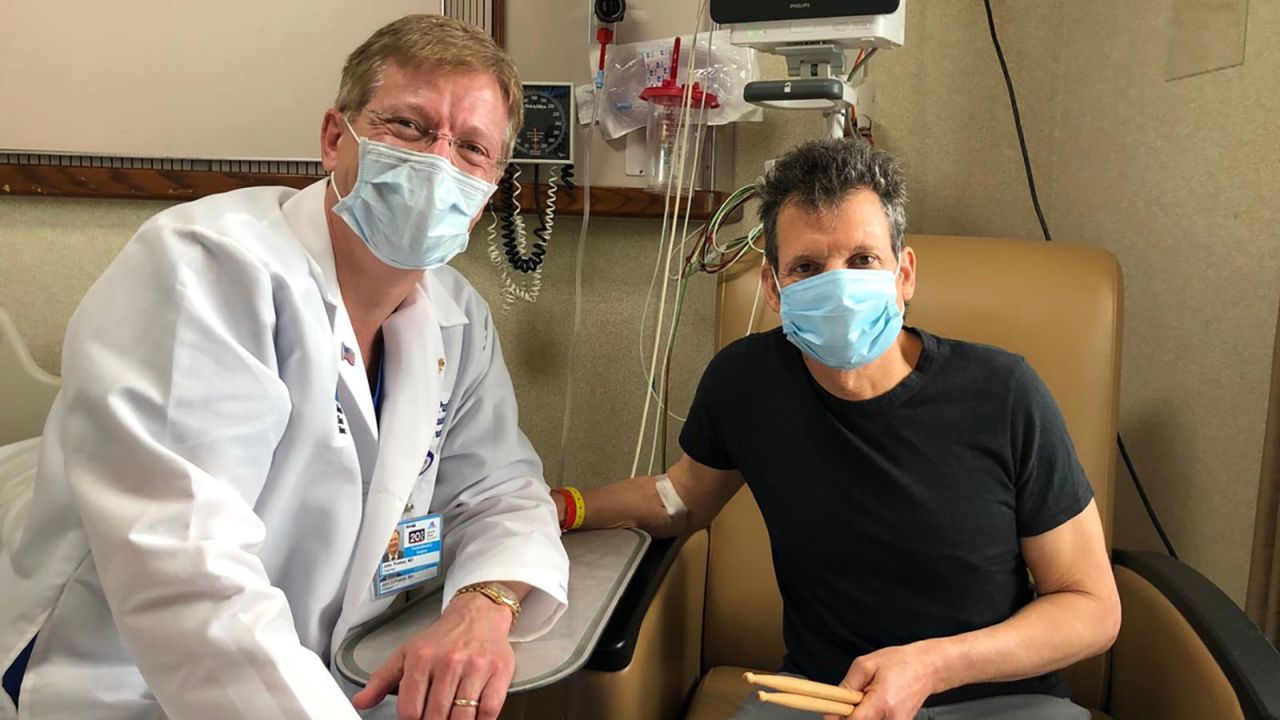 (From left) Dr. Puskas and Covid-19 survivor Ed Bettinelli are shown here after Bettinelli's successful coronary bypass surgery.