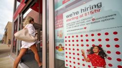 In this Sept. 2, 2020, file photo, a help wanted sign hangs on the door of a Target store in Uniontown, Pa. Hundreds of thousands of Americans likely applied for unemployment benefits last week, a high level of job insecurity that reflects economic damage from the coronavirus outbreak. Economists expect that 850,000 people sought jobless aid, down from 884,000 the week before, according to a survey by the data firm FactSet. (AP Photo/Gene J. Puskar, File)