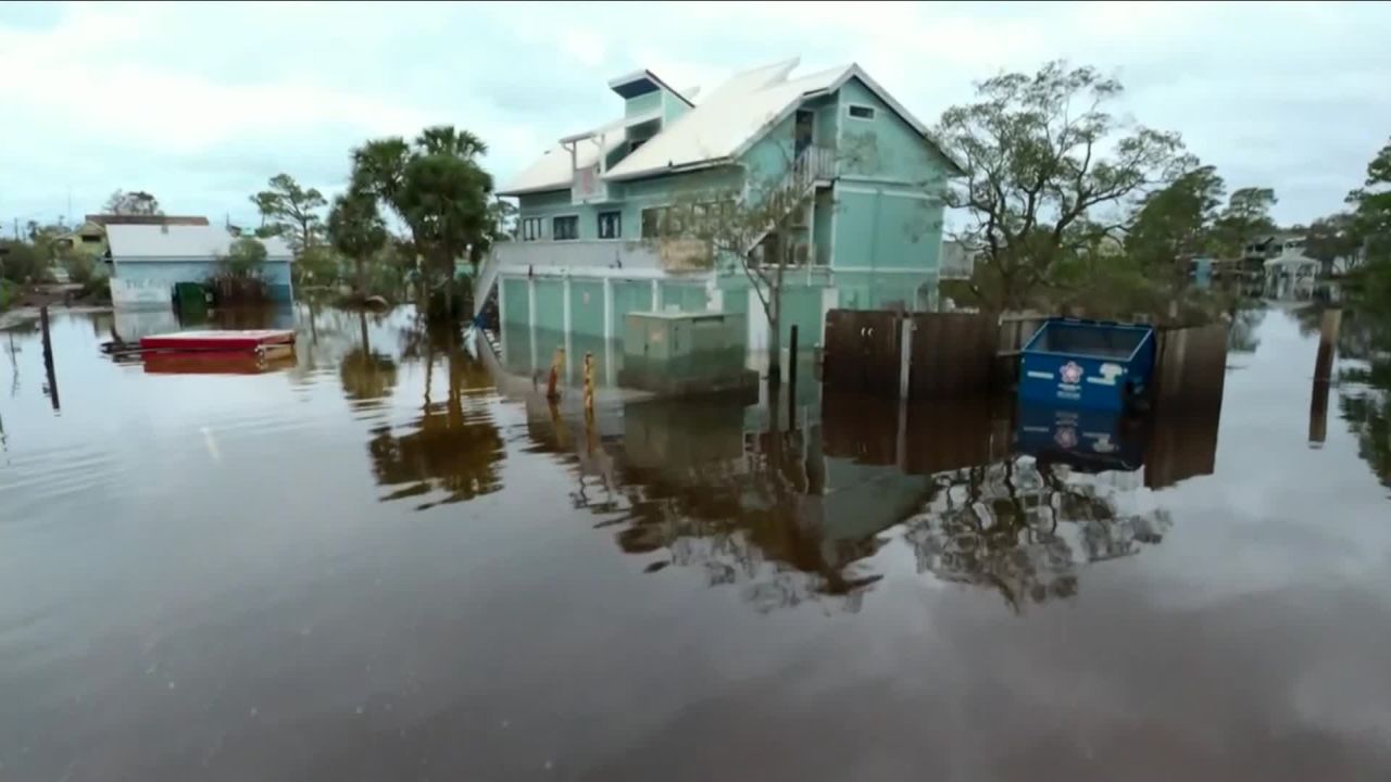Water surrounds businesses and homes Thursday morning in Gulf Shores, Alabama.