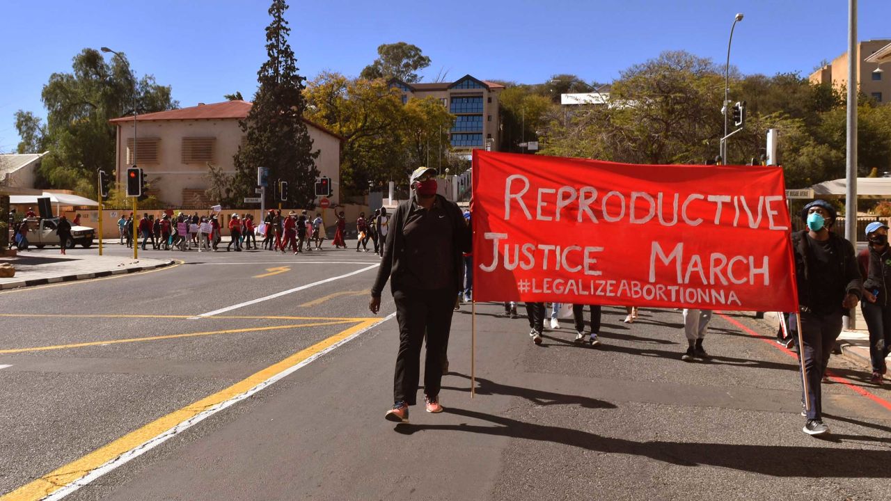 Members of the Voices for Choices and Rights Coalition march to the Zoo Park in Windhoek, Namibia, on July 18, to demand abortion reforms.