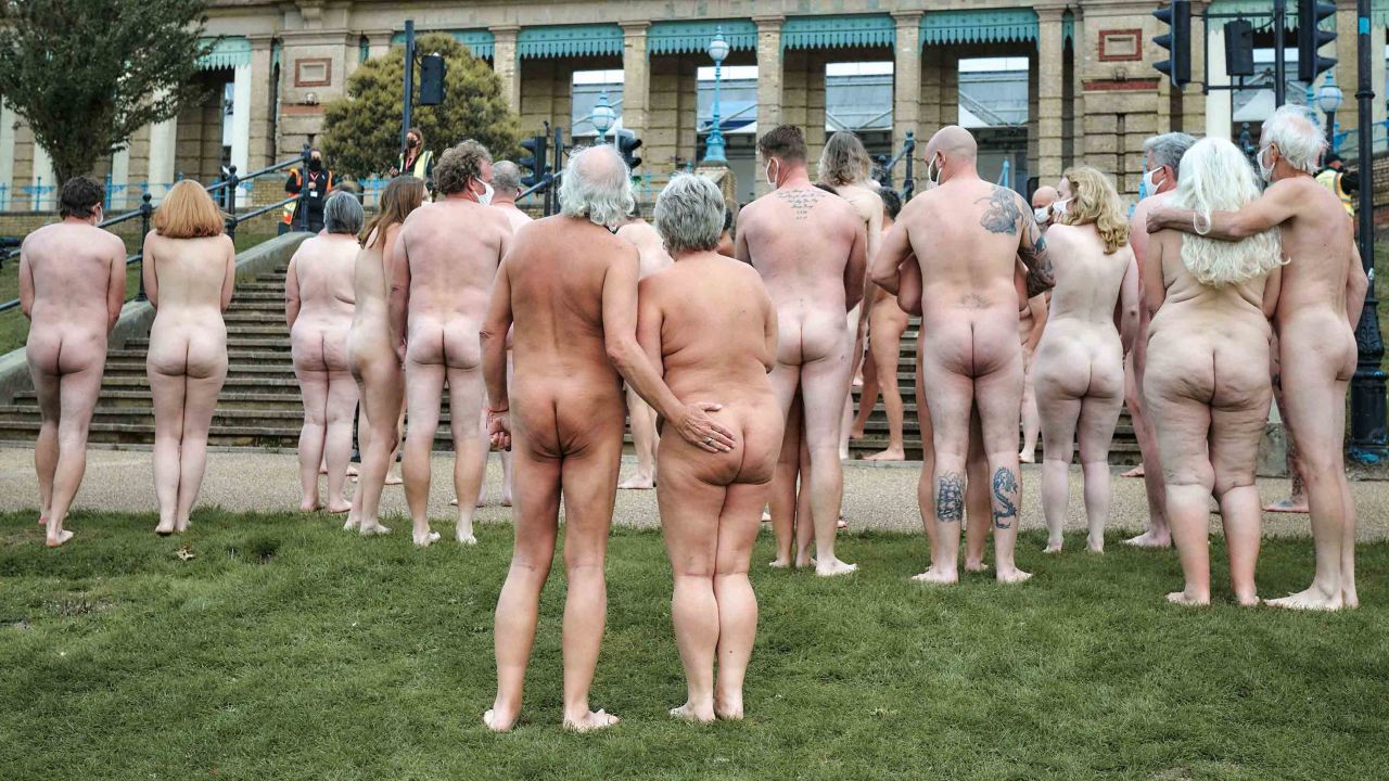 Naked Nudist Gallery - Hundreds pose nude wearing only masks in London art installation | CNN