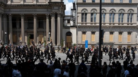 Members of the NFAC militia group march during a rally to protest the killing of Breonna Taylor in Louisville on July 25.