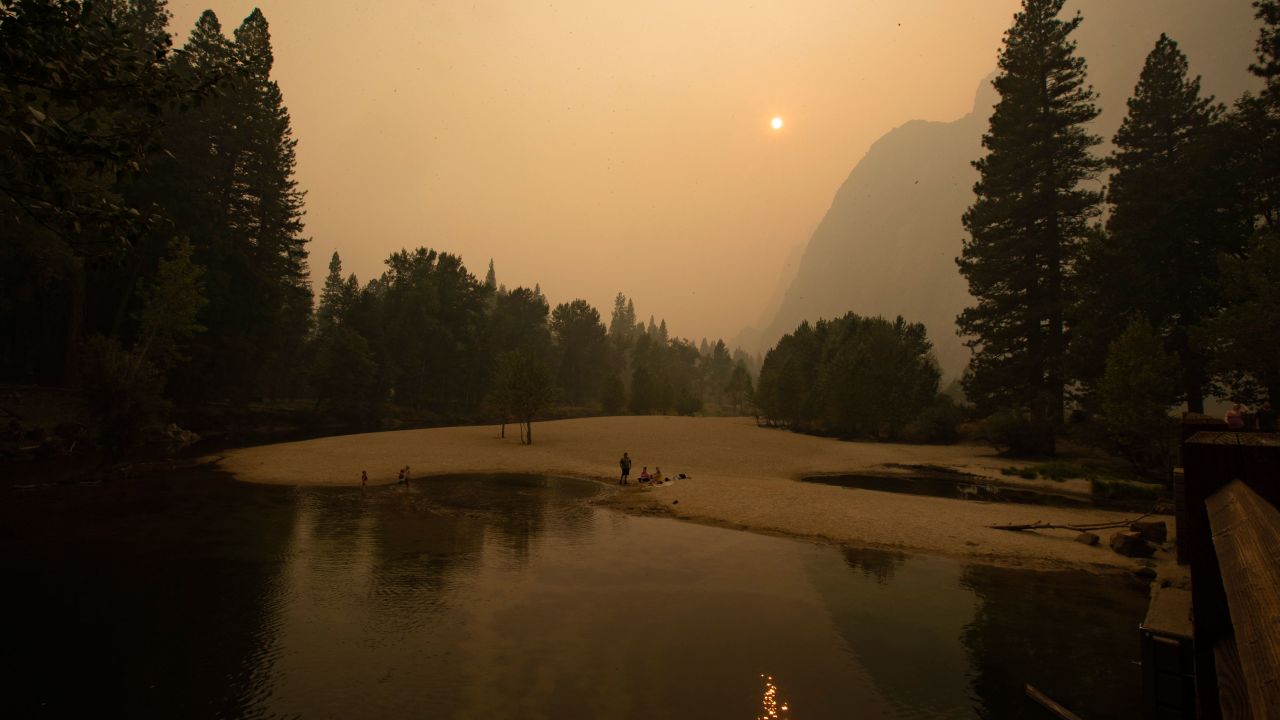 YOSEMITE NATIONAL PARK, CA - SEPTEMBER 12: Thick smoke shrouds Yosemite Valley in a view from Swinging Bridge on on the Merced River Saturday, Sept. 12, 2020 in Yosemite National Park, CA. (Brian van der Brug / Los Angeles Times via Getty Images)