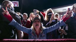 Supporters of President Donald Trump cheer as he arrives to speak at a campaign rally at Central Wisconsin Airport, Thursday, Sept. 17, 2020, in Mosinee, Wis. (AP Photo/Evan Vucci)