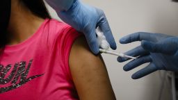 A health worker injects a person during clinical trials for a Covid-19 vaccine at Research Centers of America in Hollywood, Florida, U.S., on Wednesday, Sept. 9, 2020. Photographer: Eva Marie Uzcategui/Bloomberg via Getty Images