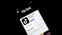 WASHINGTON, DC - AUGUST 07: In this photo illustration, the download page for the Tiki Tok app is displayed on an Apple iPhone on August 7, 2020 in Washington, DC. On Thursday evening, President Donald Trump signed an executive order that bans any transactions between the parent company of TikTok, ByteDance, and U.S. citizens due to national security reasons. The president signed a separate executive order banning transactions with China-based tech company Tencent, which owns the app WeChat. Both orders are set to take effect in 45 days. (Photo Illustration by Drew Angerer/Getty Images)