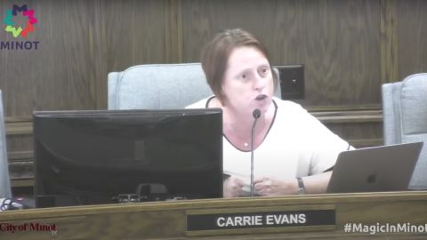 Minot City Council Member Carrie Evans pushes back on residents' objections to a Pride flag being raised at city hall.
