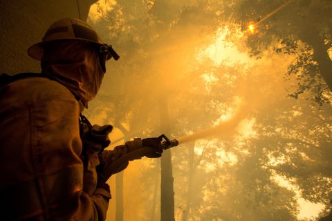 A firefighter battles the Bobcat Fire while defending the Mount Wilson observatory in Los Angeles on September 17.