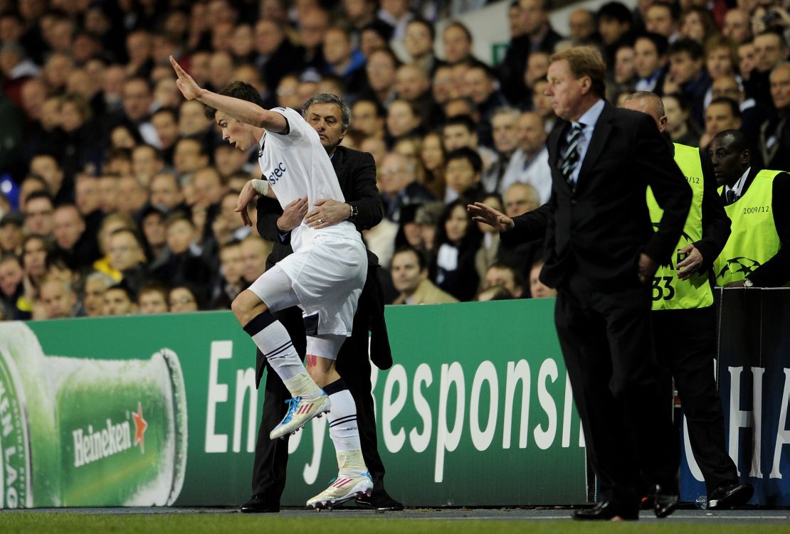 Jose Mourinho holds Gareth Bale during the Champions League quarter final in 2011.