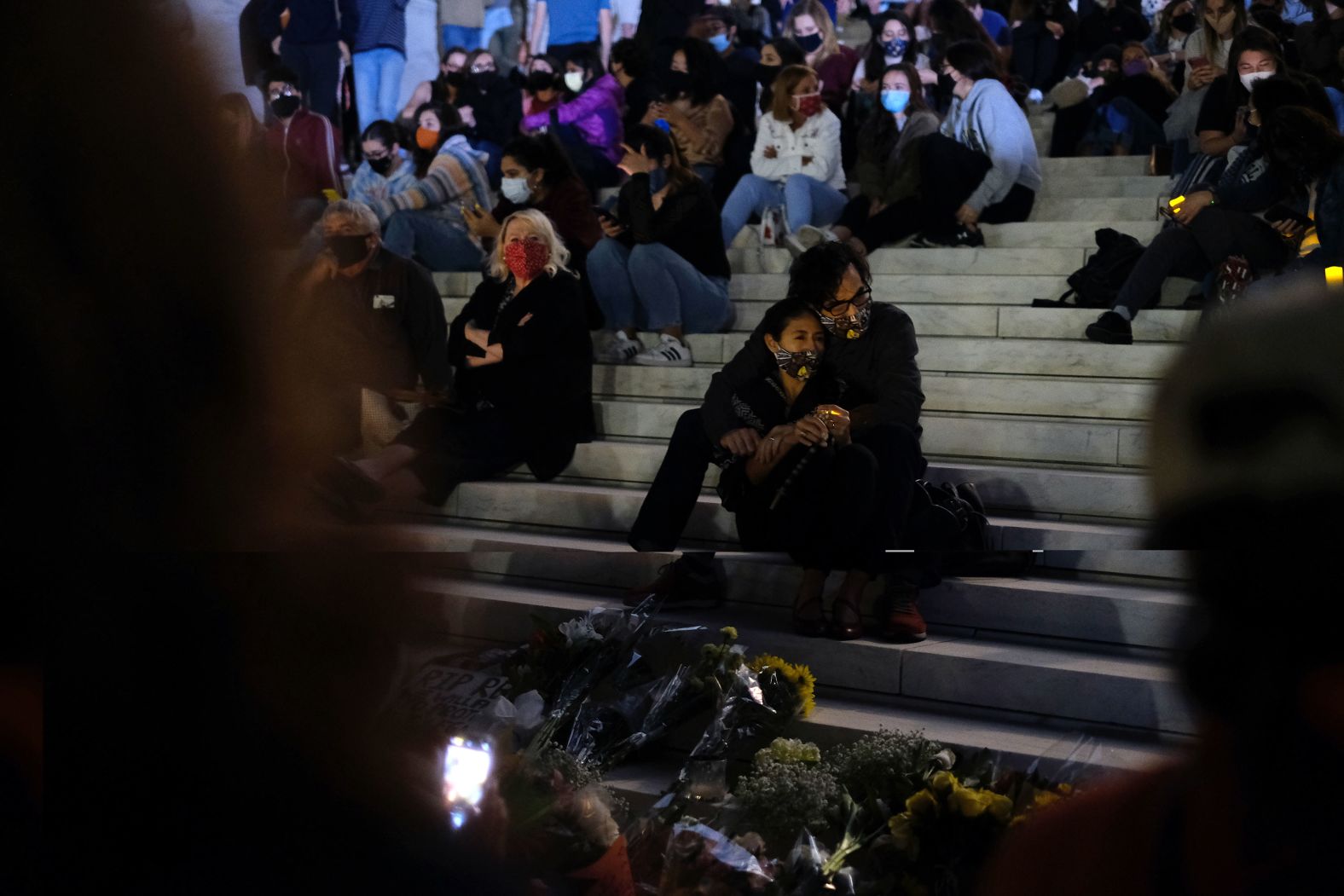 People gather on the steps of the Supreme Court on September 18.