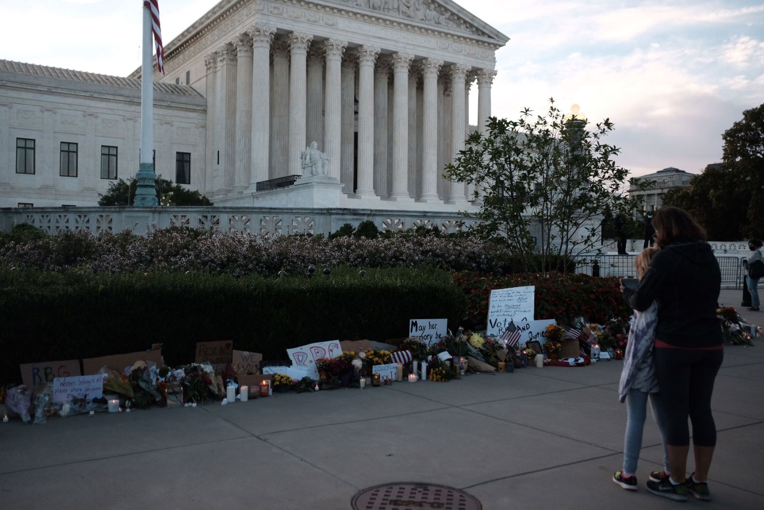 People gather at the Supreme Court on September 19.