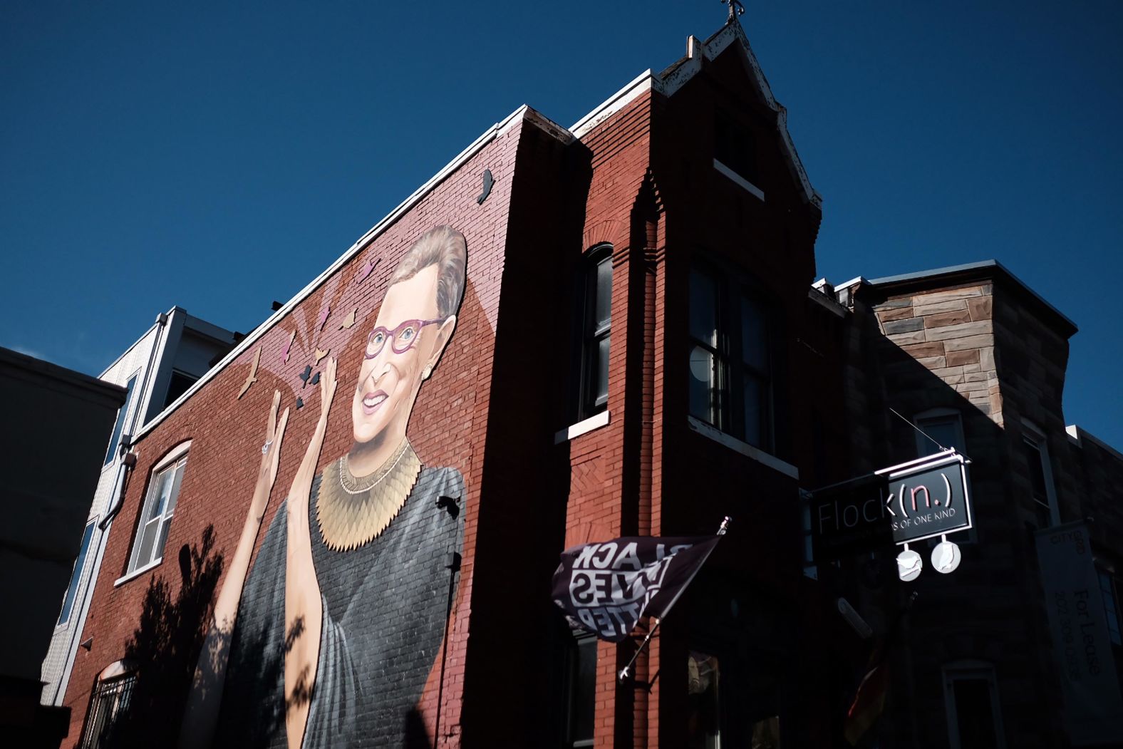 A mural of Ginsburg is seen on historic U Street in Washington, DC. Rose Jaffe, a local artist in Washington, <a href="index.php?page=&url=https%3A%2F%2Fwww.cnn.com%2F2019%2F09%2F17%2Fpolitics%2Fruth-bader-ginsburg-mural-dc%2Findex.html" target="_blank">was asked by the company Flock DC</a> to paint the mural on the side of its building in September 2019.
