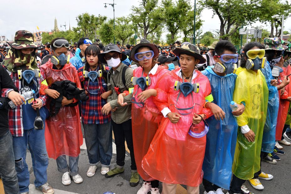 Anti-government protesters link hands as they take part in a pro-democracy rally on September 20.