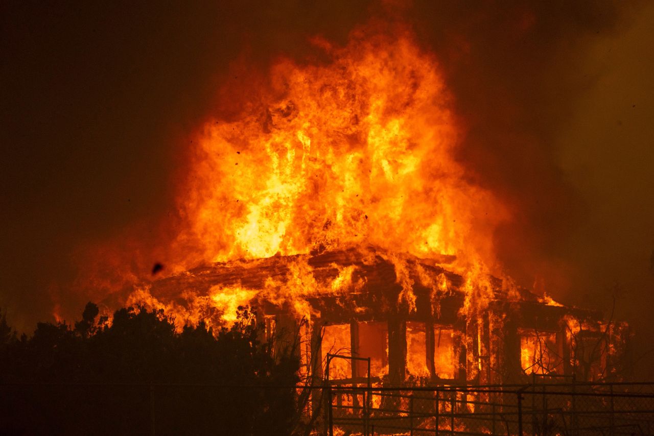 A Juniper Hills home burns during the Bobcat Fire on September 18, 2020.