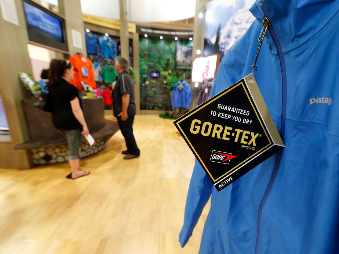 A coat sits on display as sellers and buyers look over gear at the Gore-Tex booth during the Outdoor Retailer Summer Show at the Salt Palace in Salt Lake City, Utah, Friday August 3, 2012. 