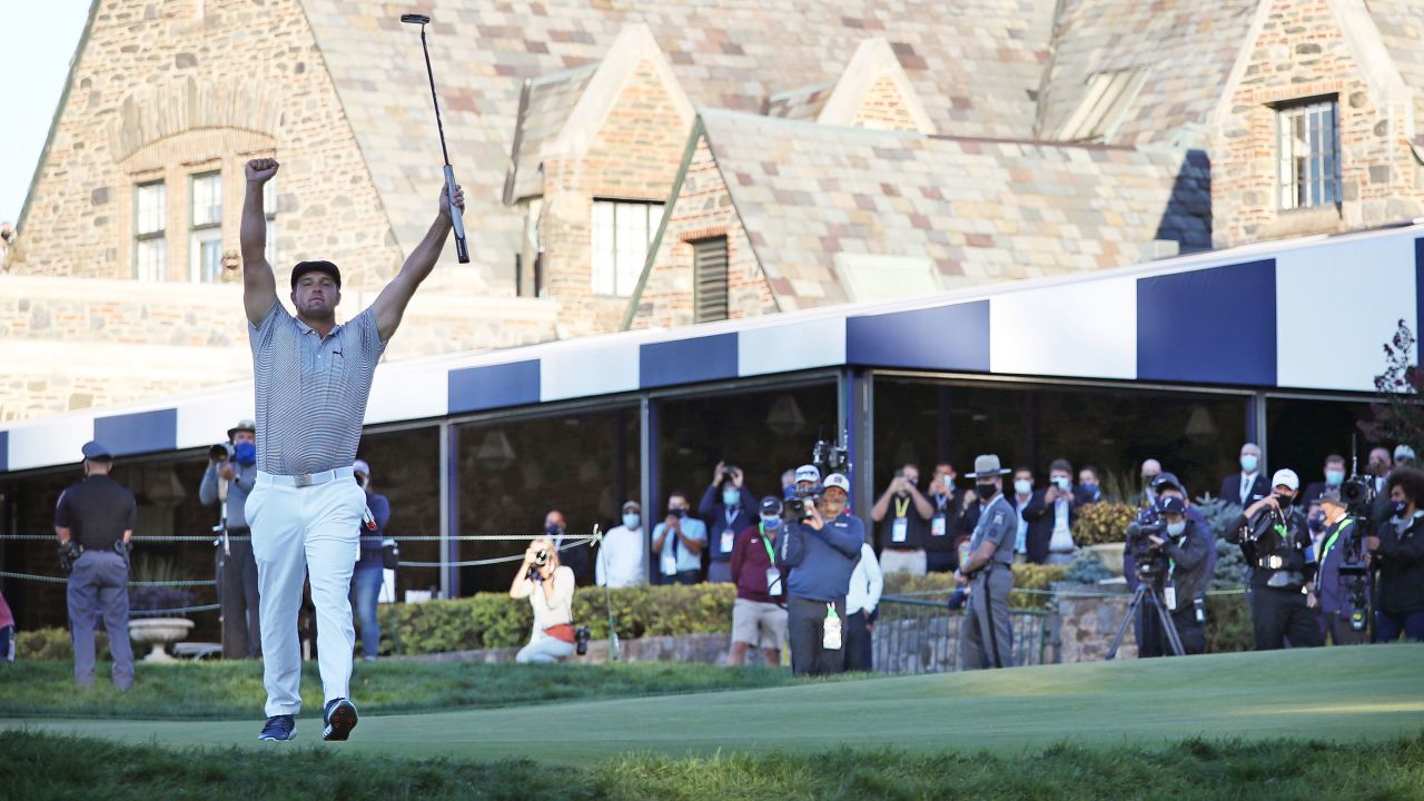 DeChambeau celebrates on the 18th green after winning the 120th US Open Championship.