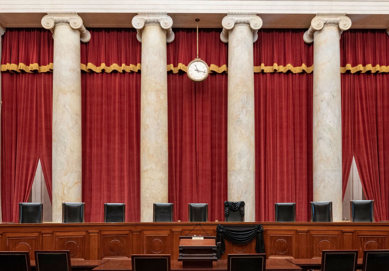 Ginsburg's bench chair is draped in black.