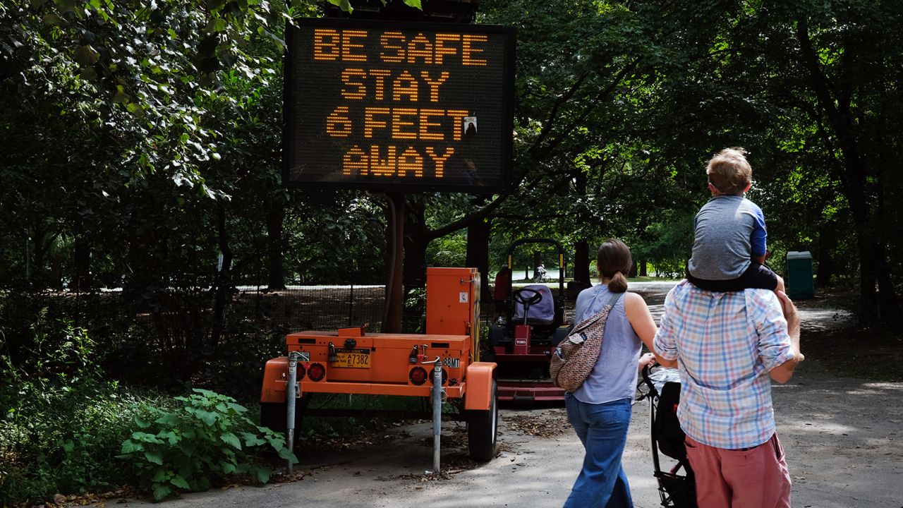 NEW YORK, NEW YORK - SEPTEMBER 14: A sign at a public park instructs people to keep their distance due to COVID-19 on September 14, 2020 in the Brooklyn borough of New York City. While New York's infection rate is currently below one percent, the U.S. as a whole stands at more than 6.7 million confirmed cases and nearly 200,000 deaths attributed to COVID-19, making it the world leader in both.  (Photo by Spencer Platt/Getty Images)