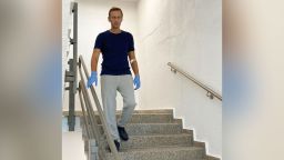 Russian opposition politician Alexey Navalny posted a photo of himself standing on the stairs and said he is still unable to use his phone properly or pour himself a glass of water but there is a ìclear roadî ahead in his recovery process.
