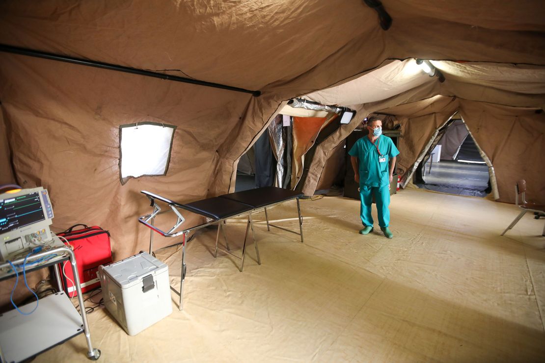 An Italian medic walks around the coronavirus ward of a field hospital on the Lebanese University campus in Hadath on September 8.