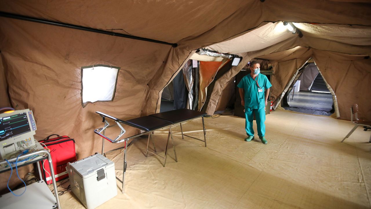 An Italian medic walks around the coronavirus ward of a field hospital on the Lebanese University campus in Hadath on September 8.