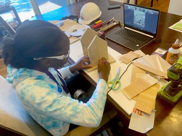 This year's Tools & Tiaras camp was virtual, allowing for girls all over the country to participate in the New York City based program.<br /><br />Here, a camper creates a bird feeder. 