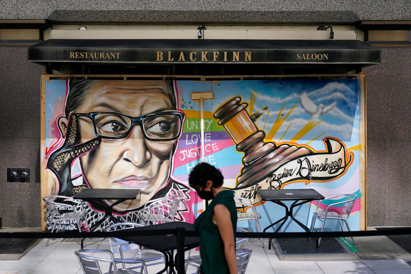 A mural honors Ginsburg outside the Blackfinn Ameripub in Washington, DC.