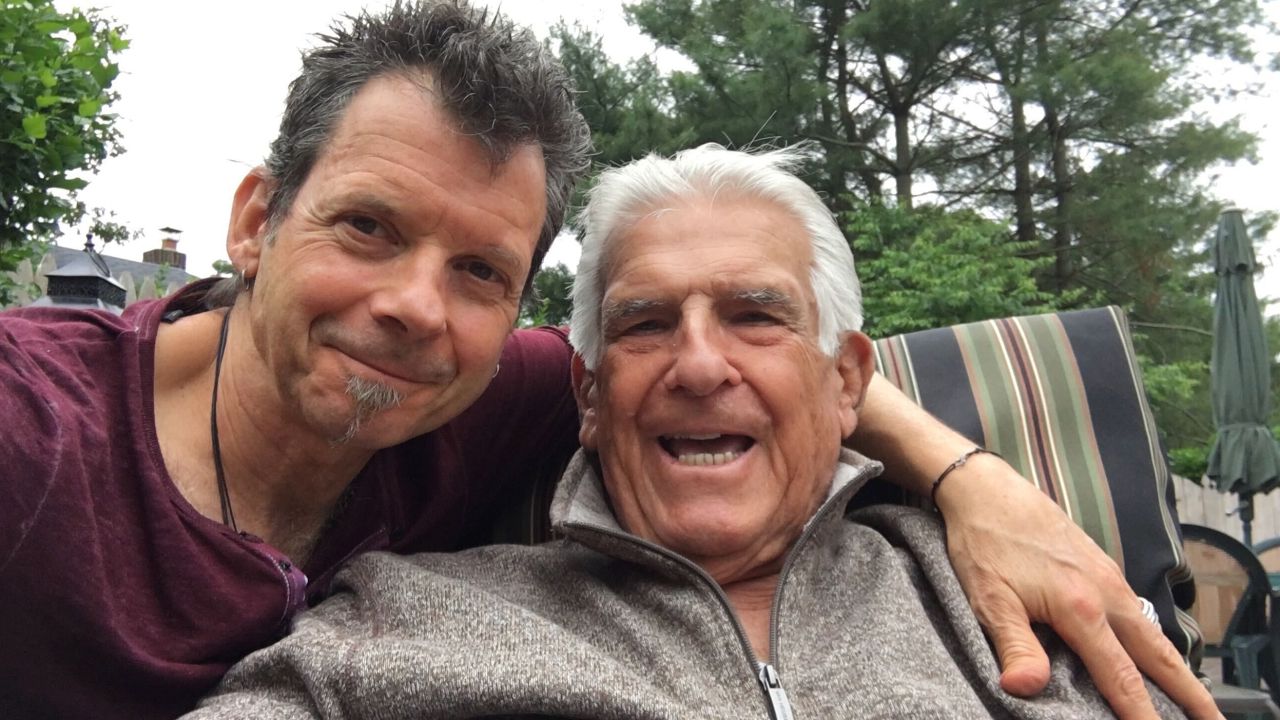 Ed Bettinelli (left) with his 89-year-old father, Ramon Bettinelli, last summer. Ramon died from Covid-19 in April of this year.