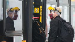 TORONTO, Sept. 17, 2020-- A man wearing a mask and a face shield gets on a bus in Toronto, Canada, on Sept. 17, 2020. The number of COVID-19 cases in Canada rose to 140,539 on Thursday, with 9,199 deaths, according to CTV. (Photo by Zou Zheng/Xinhua via Getty) (Xinhua/Zou Zheng via Getty Images)