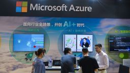 People learn about AI solutions offered by Microsoft Azure at an expo of artificial intelligence application in Suzhou in east China's Jiangsu province Friday, Aug. 14, 2020. 