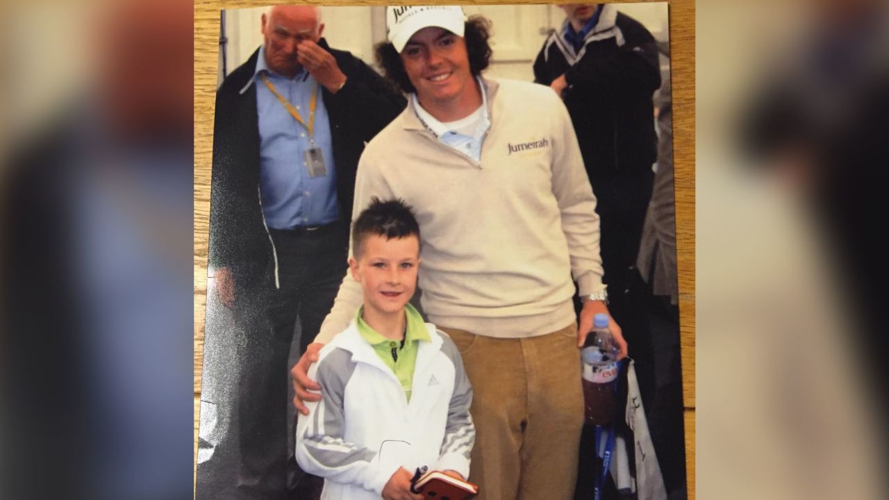 Lawlor poses with Northern Irish golfer Rory McIlroy.