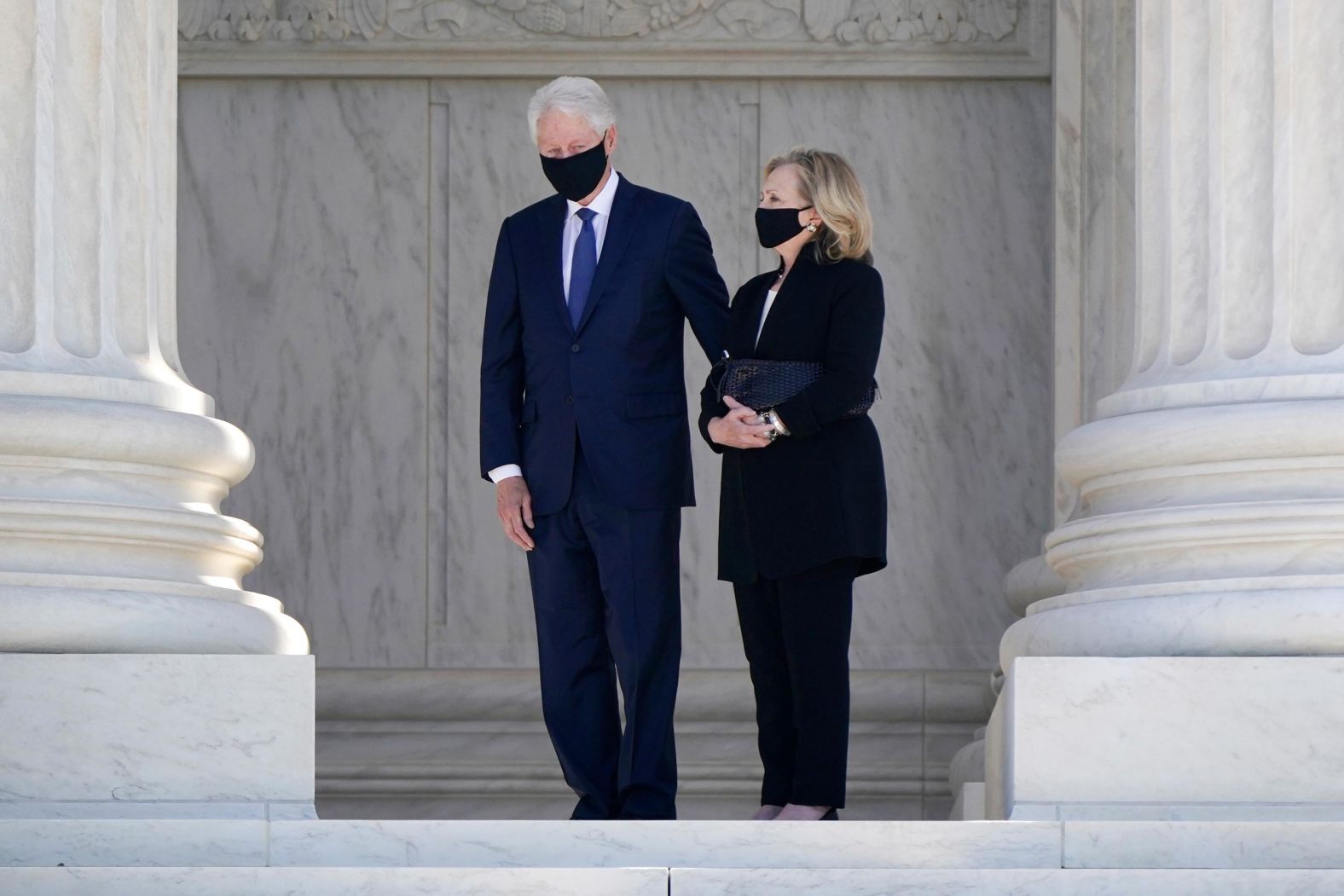 Former President Bill Clinton and former Secretary of State Hillary Clinton pay their respects. Ginsburg was appointed to the Supreme Court by President Clinton in 1993.