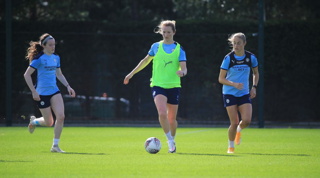 Manchester CIty's Rose Lavelle, Sam Mewis and Janine Beckie in action during training at Manchester City.