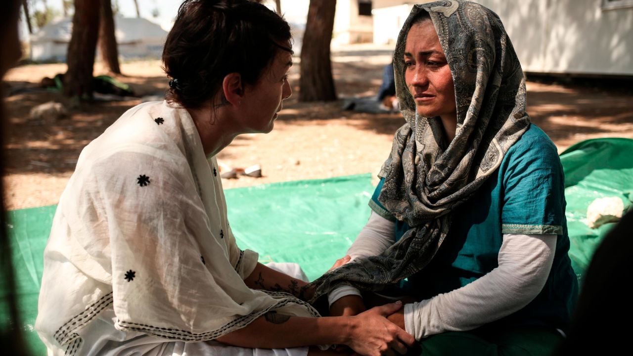 Game of Thrones actress Lena Headey, left, talks to Afghan refugee Rehanna, age 27, at the Diavata refugee camp, in Northern Greece, Thursday, June 30, 2016. Rehanna is a mother of 5-year old twin girls named Marzia and Razia. She is also five months pregnant. She is from Darai Souf, in Afghanistan. Her home was bombed twice. They fled to Iran, and then through Turkey to reach Greece by boat. Their boat nearly capsized and filled with water en route, and their neighbors' son drowned. They've lost all of their belonging and she was separated from her husband, as they tried to sneak through the border in Northern Greece. Since then she hasn't had not seen nor heard from him. Rehanna hopes to get to Austria, where her brother lives. (Photo credit/Tara Todras-Whitehill for the International Rescue Committee)