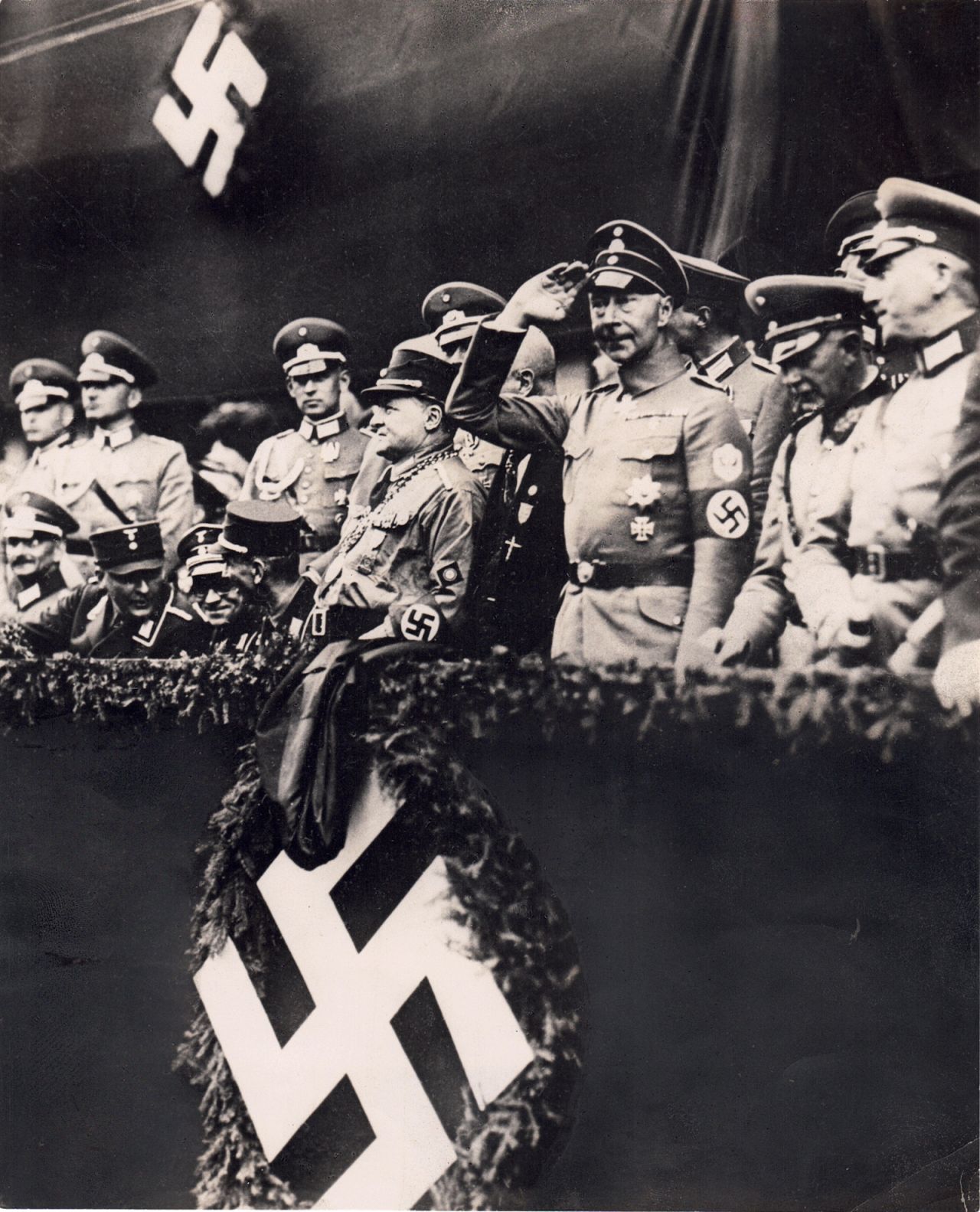 A photograph discovered by historian John Rohl shows Germany's former Crown Prince Wilhelm saluting at an SA rally in October 1933. 