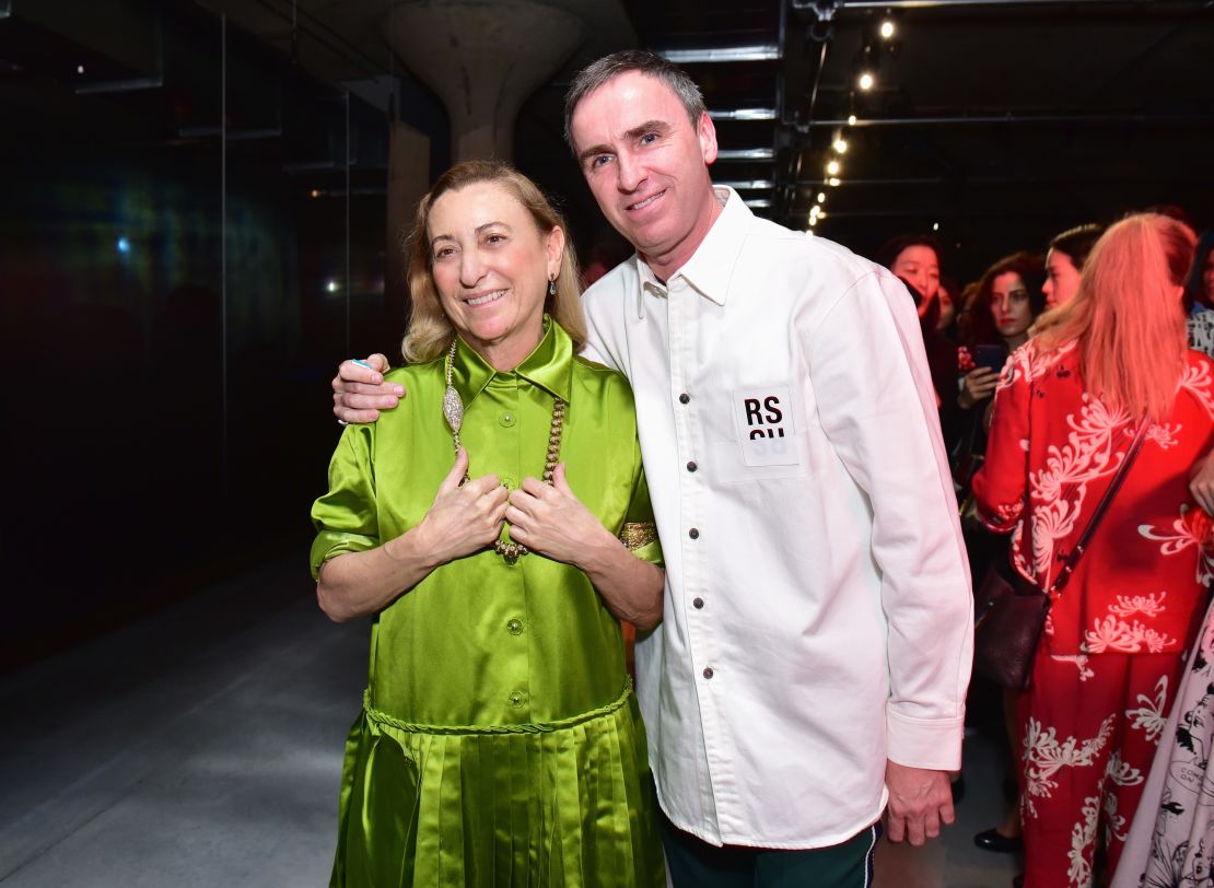 Designer Miuccia Prada and designer Raf Simons attend the Prada Resort 2019 fashion show on May 4, 2018 in New York City. 
