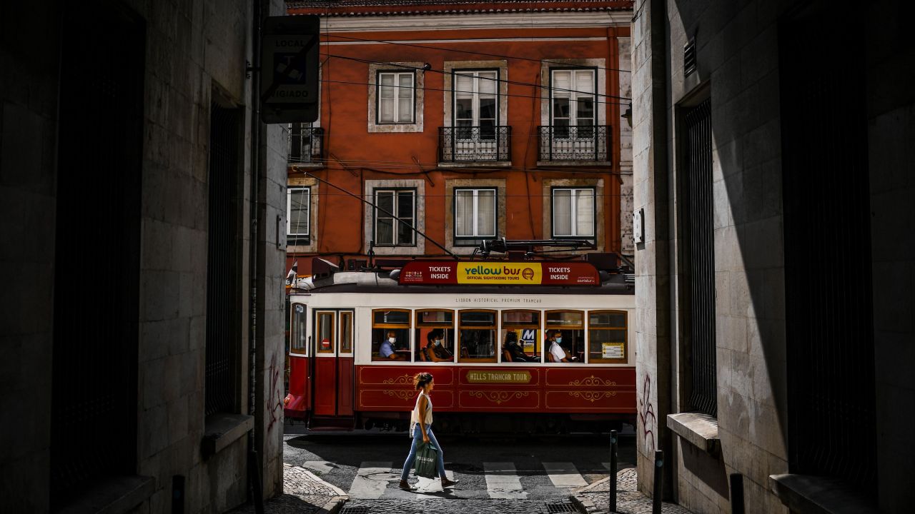 <strong>Lisbon:</strong> A tram passes through the Bairro Alto neighborhood, celebrated for its shops and nightlife. 